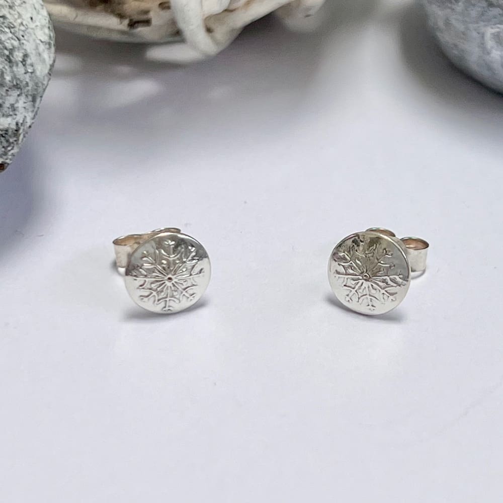 Handmade dainty silver snowflake stud earrings