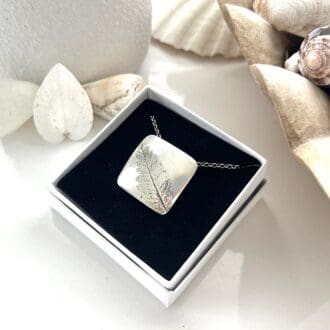 Square Fine silver 999 pendant with a pressed leaf design sterling silver chain