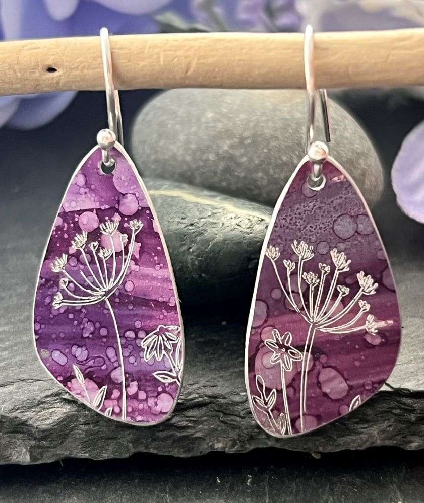 plum earrings with botanical detail