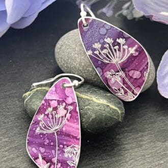 plum earrings with botanical detail