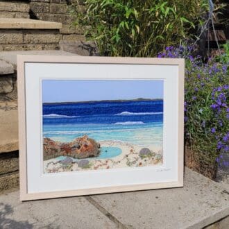 Large hand embroidered framed embroidery of a beach scene showing a rock pool with lots of shell and pebble detail. Total size is 54 x 44cm.