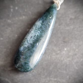 Wildwoods Moss Agate Pendant in teardrop shape with sterling silver freeform bail.