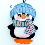 C) Pale Blue Hat & Pale Blue Scarf with Green & Red Check £0.00