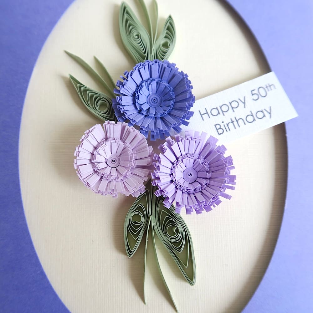 Handmade 50th birthday card with lilac quilled flowers