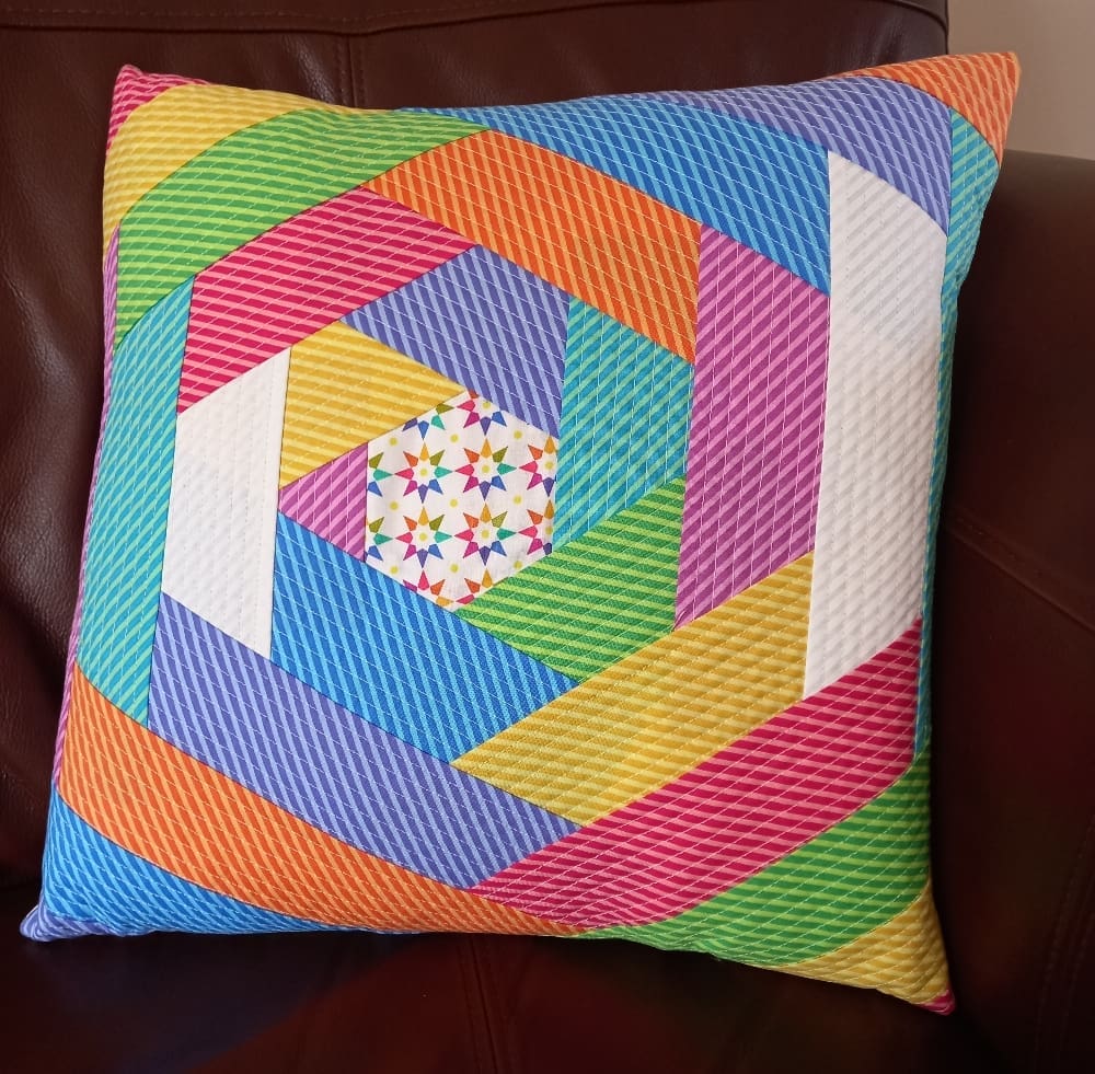 Rainbow quilted colourful cushion