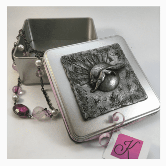 Red Squirrel design square tinplate decorative box with a sculpted relief plaque in cold-cast pewter on the push on lid. Made by Kirsty Armstrong Sculpture