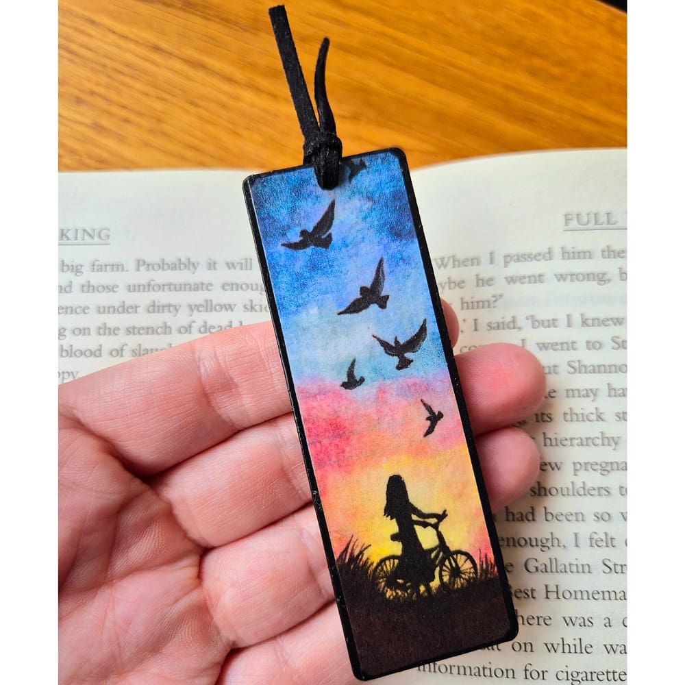 Wooden bookmark - girl on bike - sunset