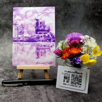 Image titled Ardvreck Castle showing an A6 size greetings card, blank inside, on a small easel depicting a view of Ardvreck Castle on Loch Assynt, Sutherland in purple watercolour.