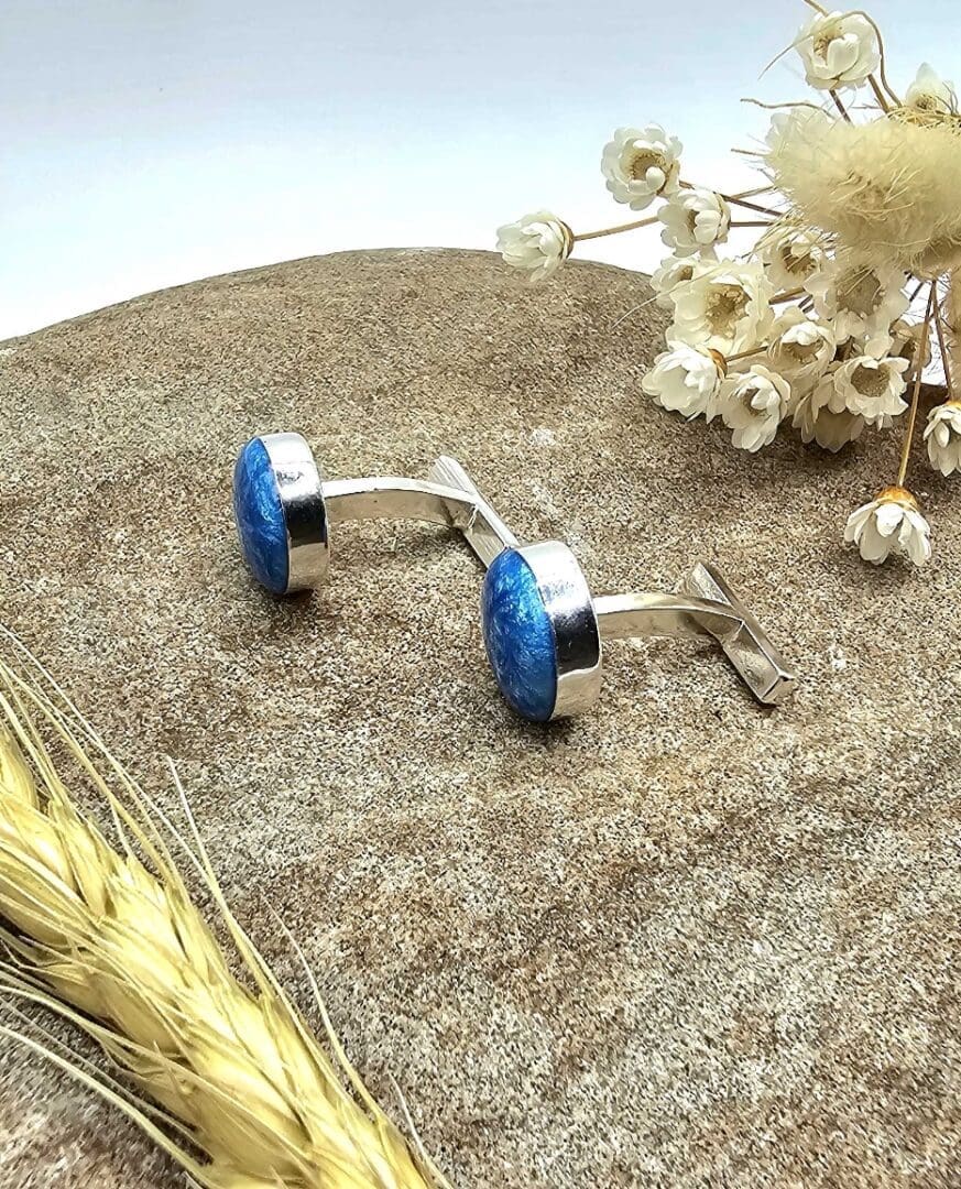 Pair of handmade sterling silver gents cufflinks with deep blue nebula-like resin keepsake stone on each cufflink