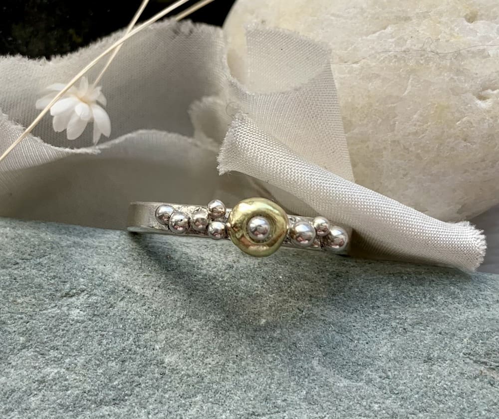 centre stacking ring silver gold pebbles