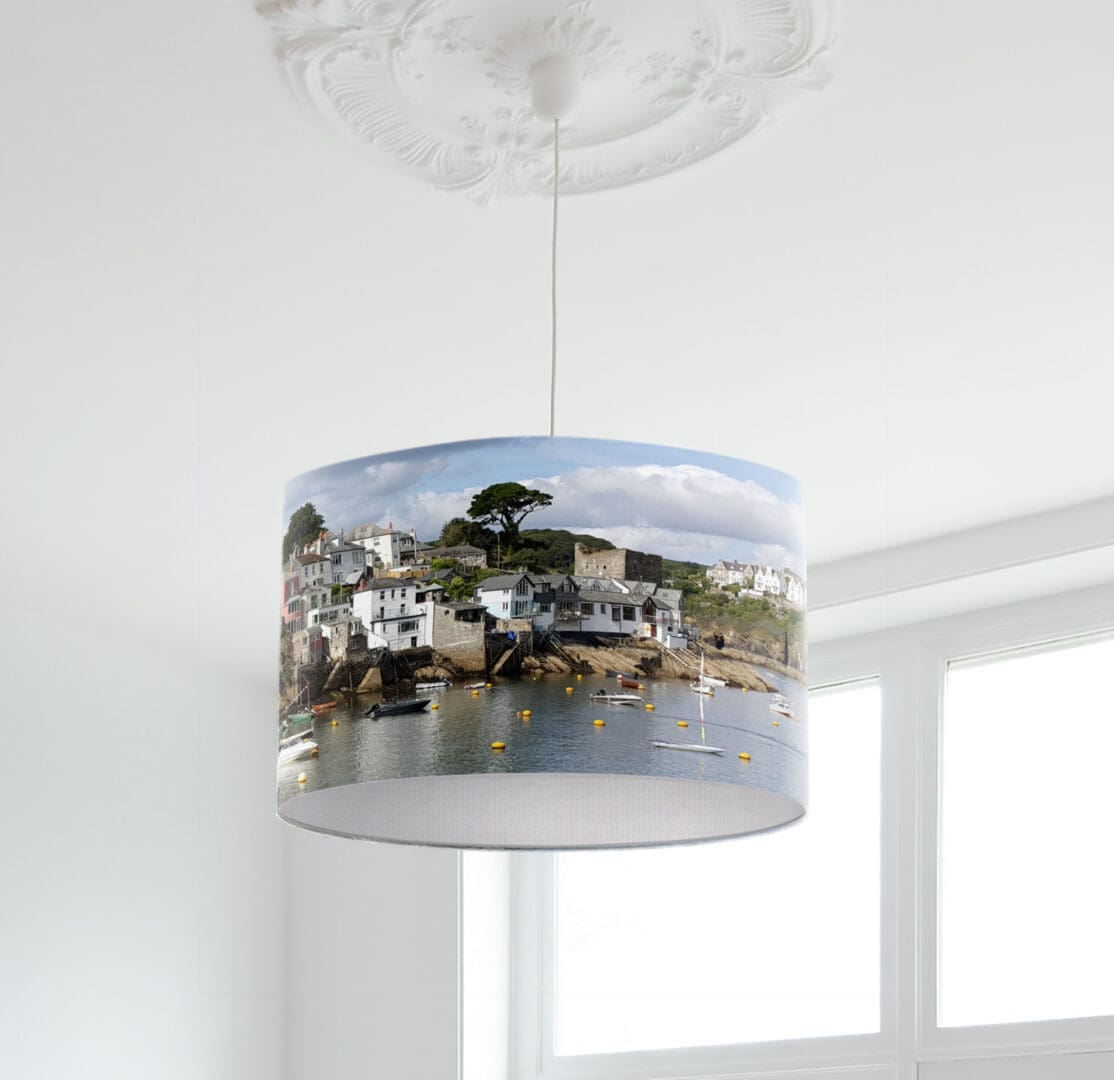 lampshade of polruan cornwall coastal lighting with a seaside print