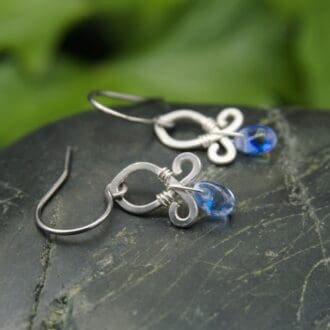 Small handmade sterling silver drop earrings with blue beads by Oruki Design