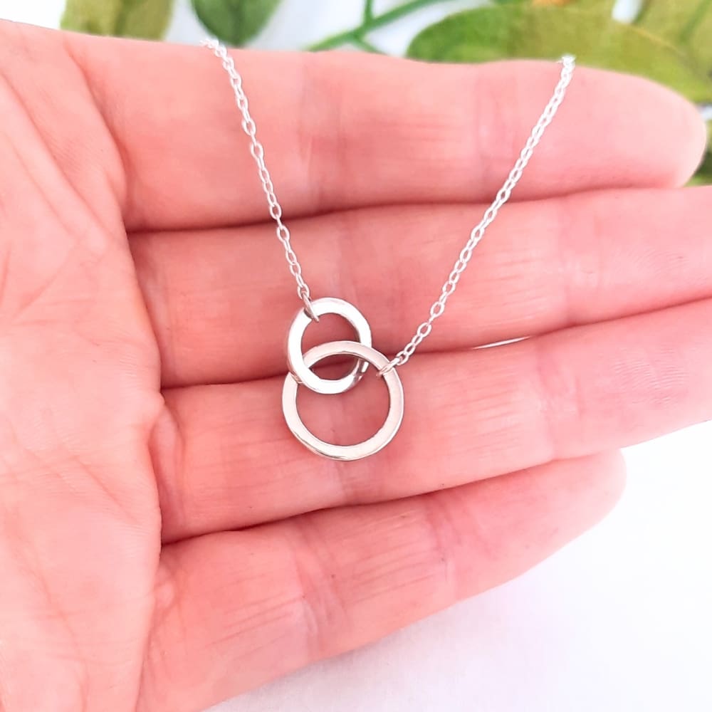 Silver connecting circles necklace.