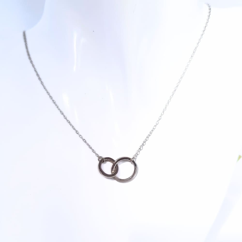 Silver connecting circles necklace.