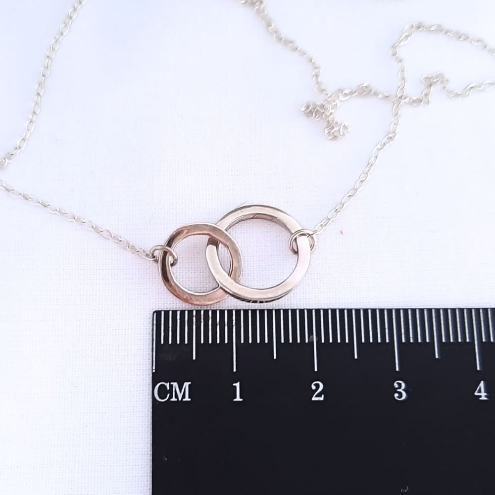 Silver connecting circles necklace.