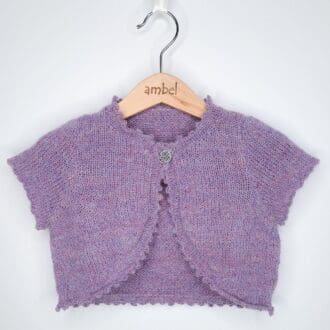 Stunning handknitted girls bolero cardigan in luxurious Peruvian wool combining merino, alpaca and silk fibres.