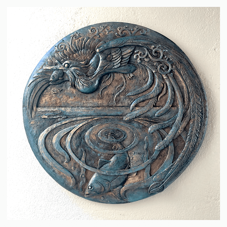 Circular wall art piece in low relief featuring a phoenix-like Halcyon bird from Greek mythology and Fish. By sculptor Kirsty Armstrong