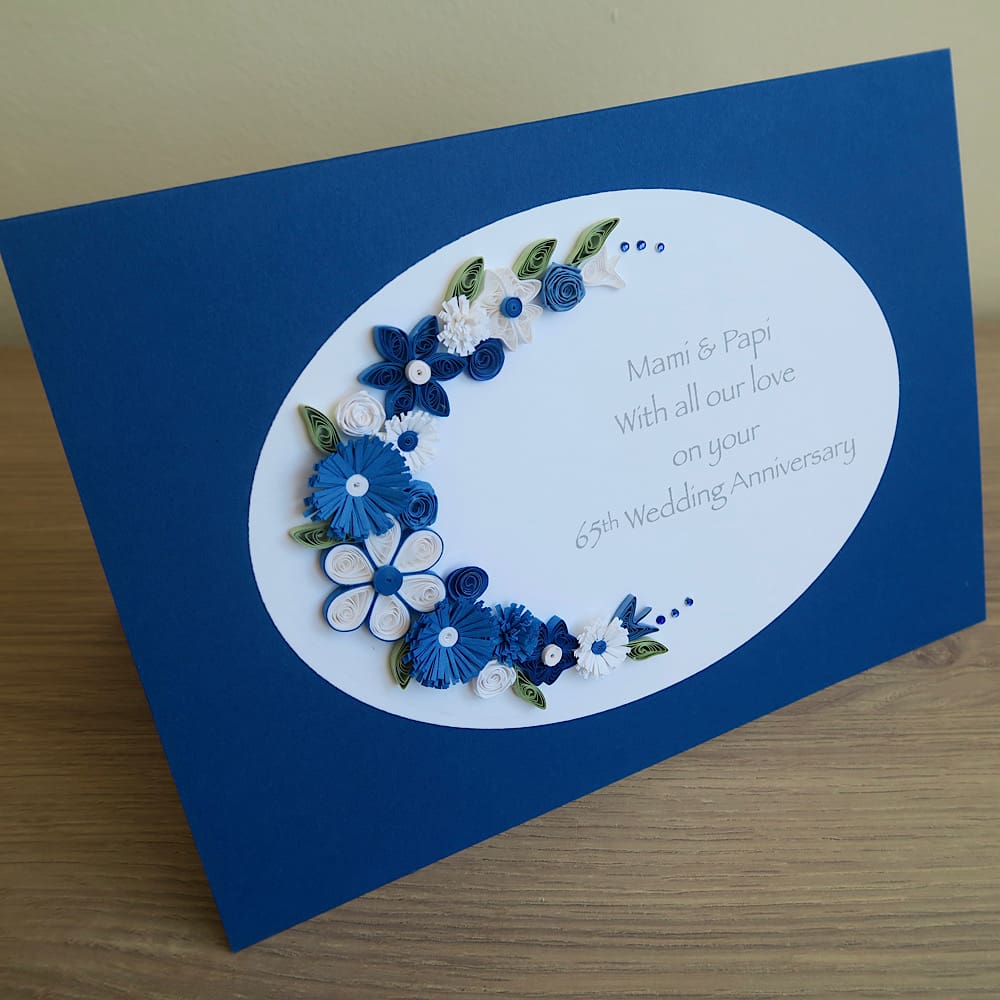 Handmade anniversary card for 65th wedding with blue and white quilled flowers