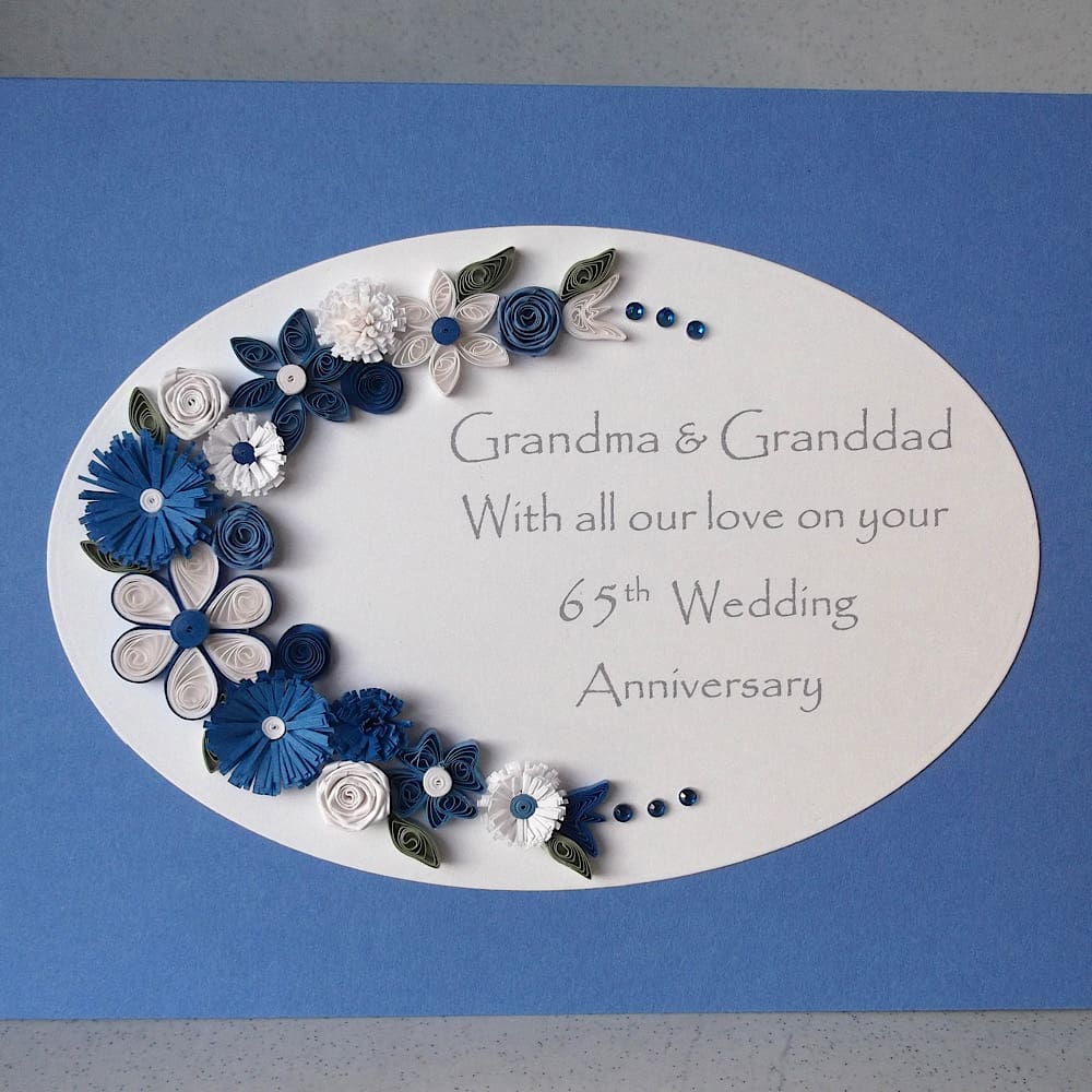 Handmade anniversary card for 65th wedding with blue and white quilled flowers