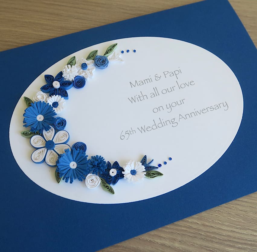 Handmade anniversary card for 65th wedding with blue and white quilled flowers