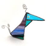 Blue and purple striped bird £0.00