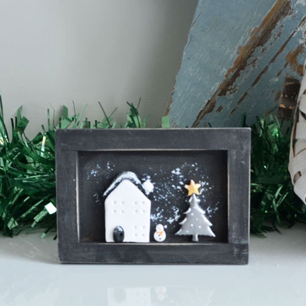 Handmade miniature wooden frame with clay Christmas scene