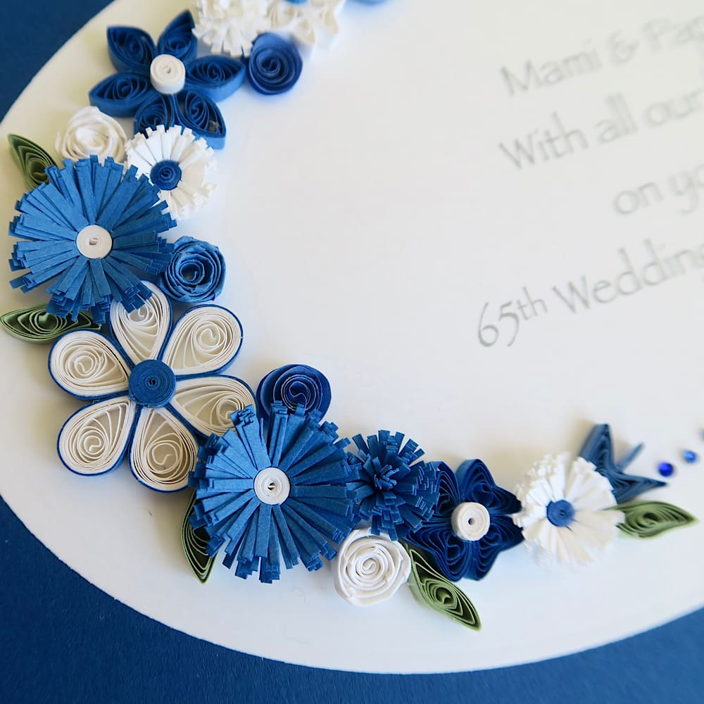 Handmade anniversary card for 65th wedding with blue and white quilled flowers