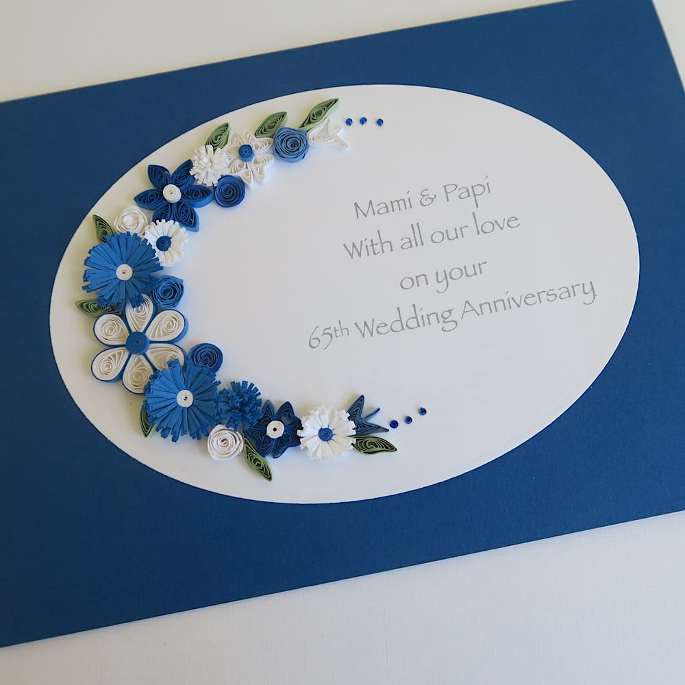 Handmade anniversary card for 65th wedding with blue and white quilled flowers