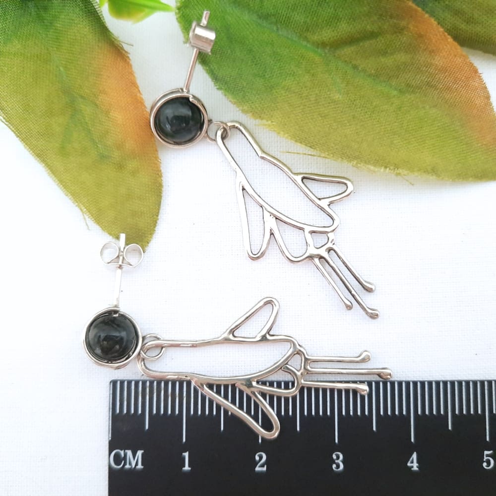 Dangly sterling silver fuchsia flowers on green moss agate stud earrings.