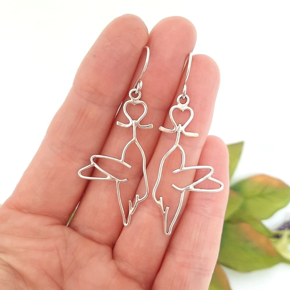 Sterling silver hummingbird and bleeding heart flower earrings.