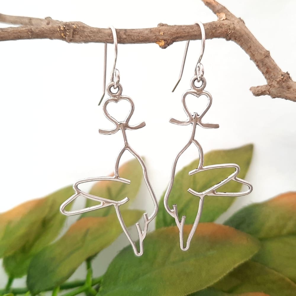 Sterling silver hummingbird and bleeding heart flower earrings.