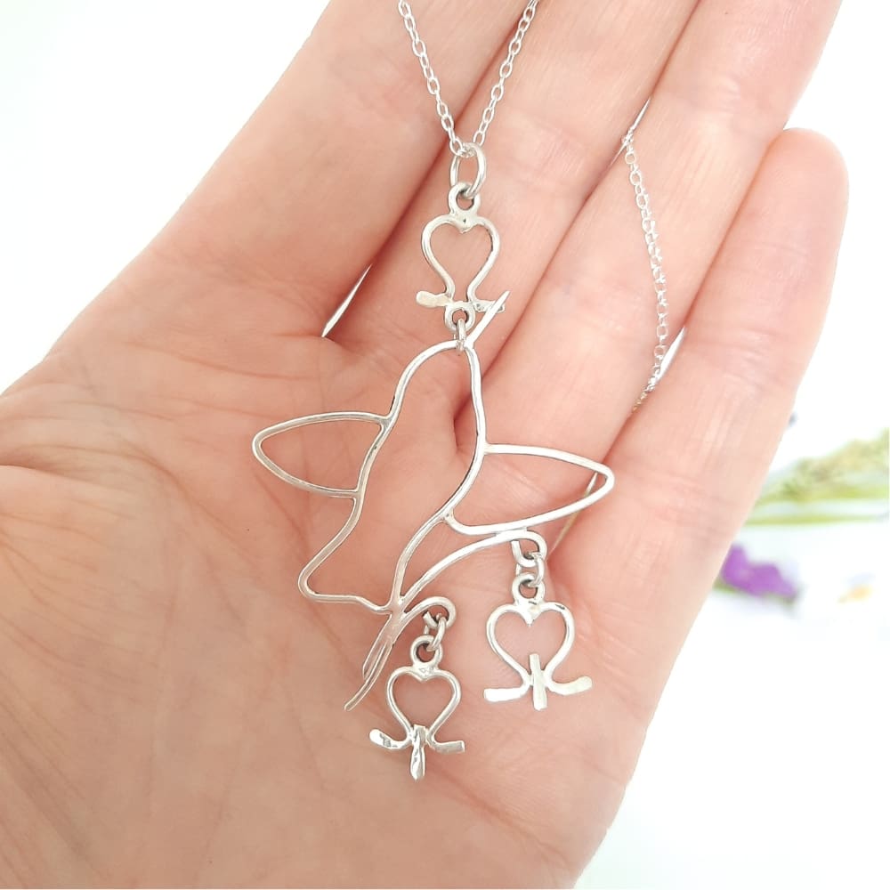 Sterling silver hummingbird and bleeding heart flowers pendant necklace.