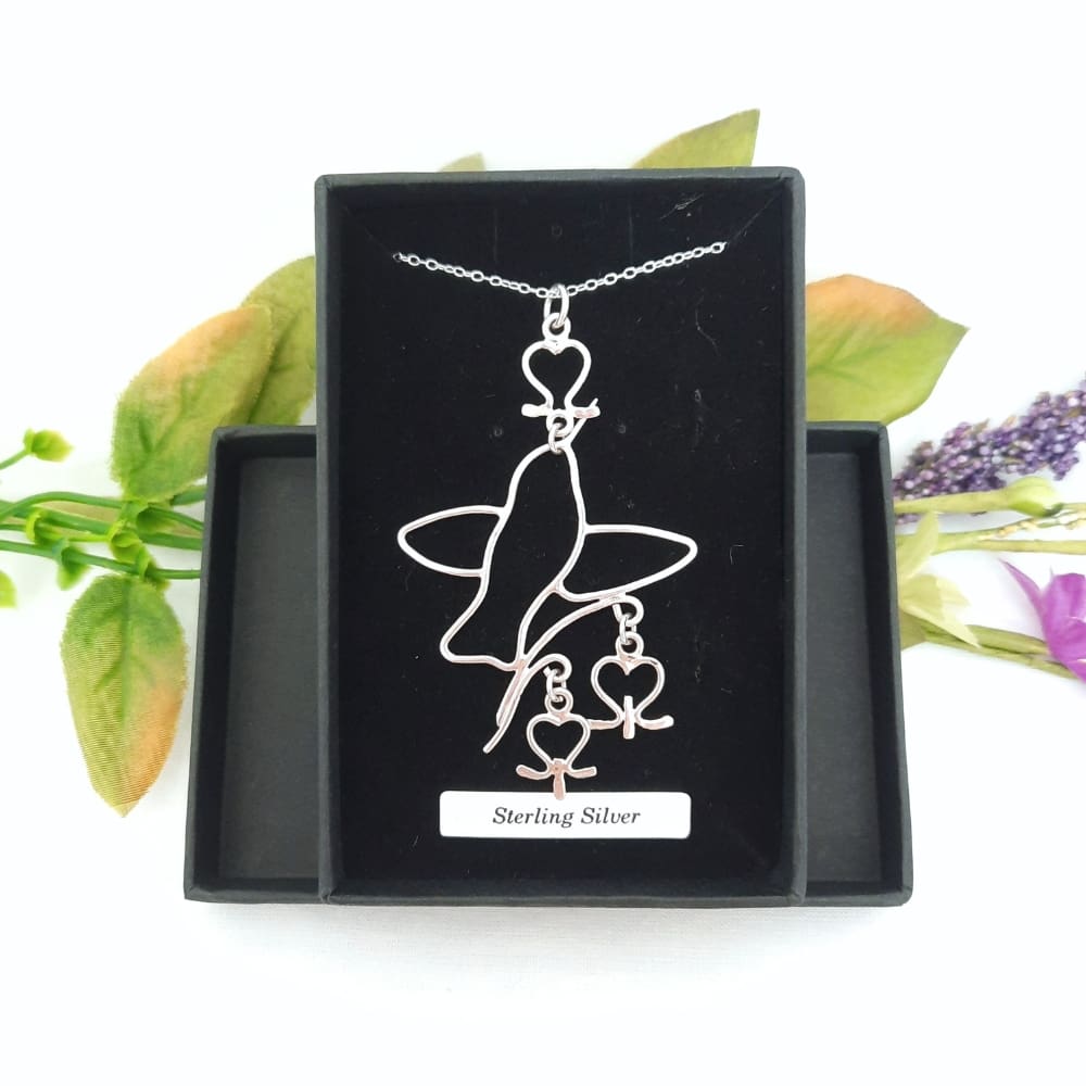 Sterling silver hummingbird and bleeding heart flowers pendant necklace.