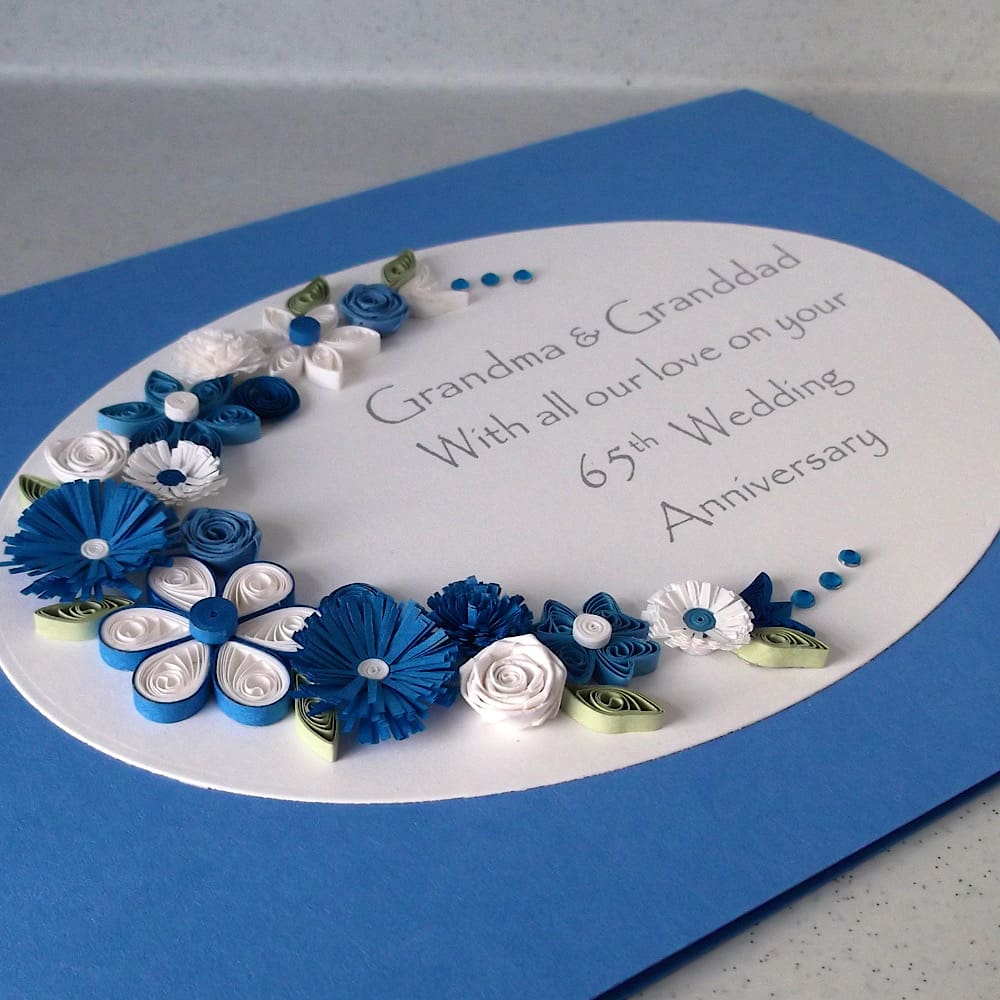 Handmade anniversary card for 65th wedding with blue and white quilled flowers