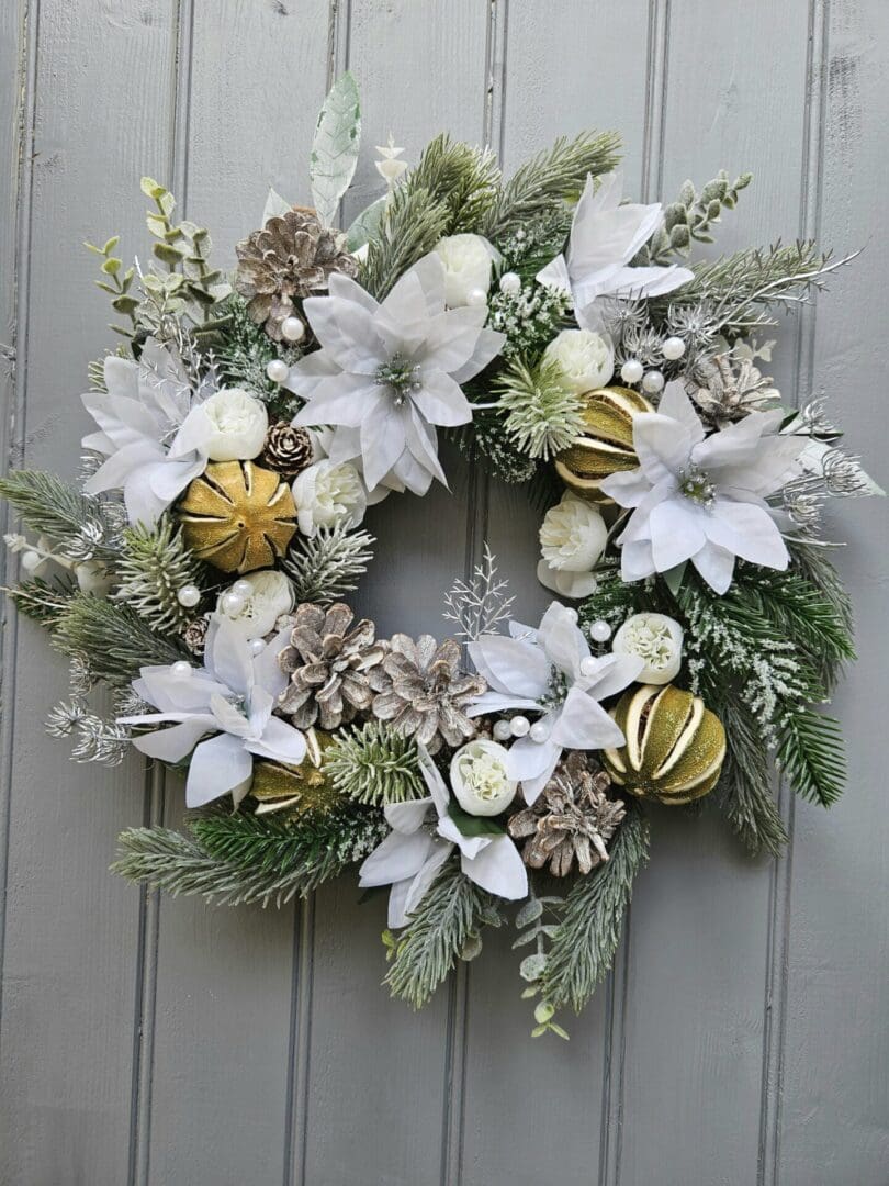 Christmas Wreath with limes and white poinsettia