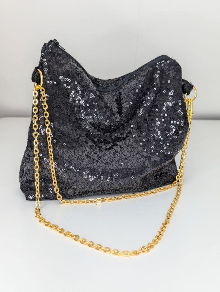 Black sequin party bag with gold coloured chain