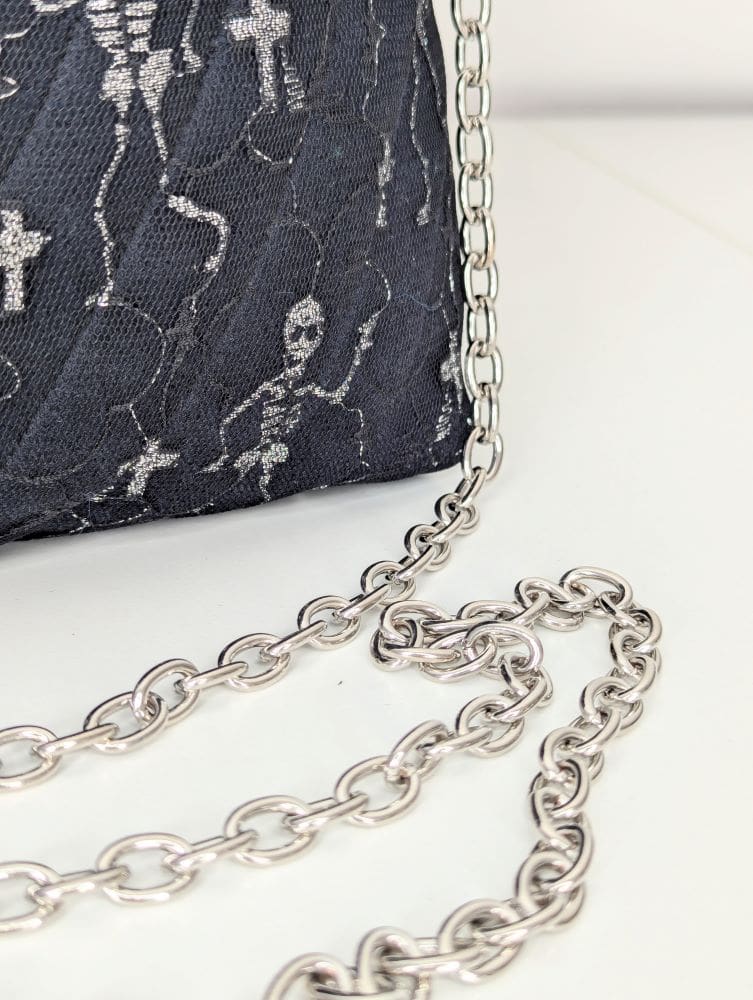 Female halloween party bag for adults showing the chunky silver chain