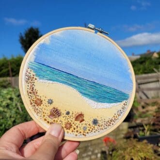 Hand embroidered shoreline beach scene 6 inch hoop.