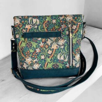 crossbody bag for ladies with two front zip pockets, a top zip, fully lined with interior pockets