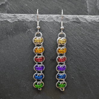 chainmaille earrings made in the barrel weave pattern using silver and rainbow coloured rings