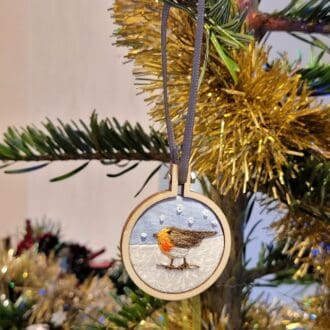 Hand embroidered robin Christmas tree decoration.