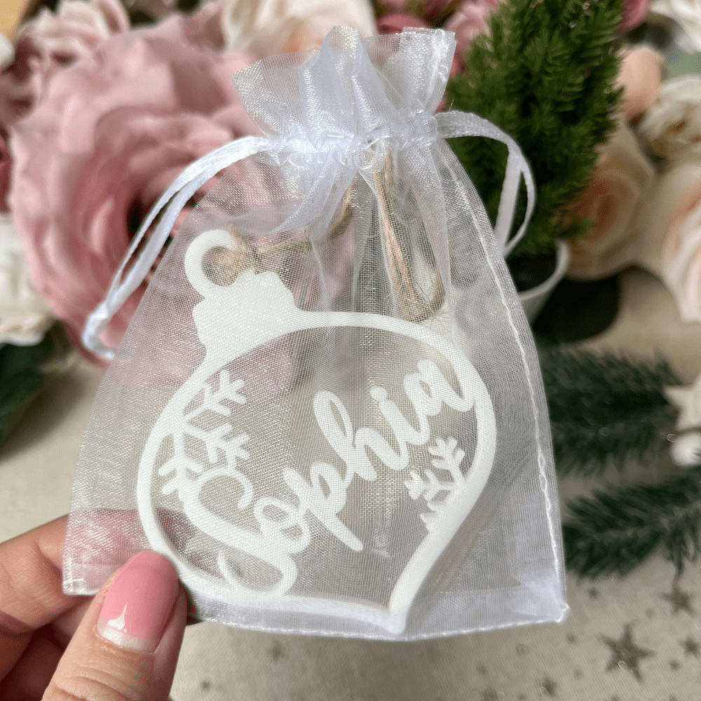 white Christmas tree decoration with name