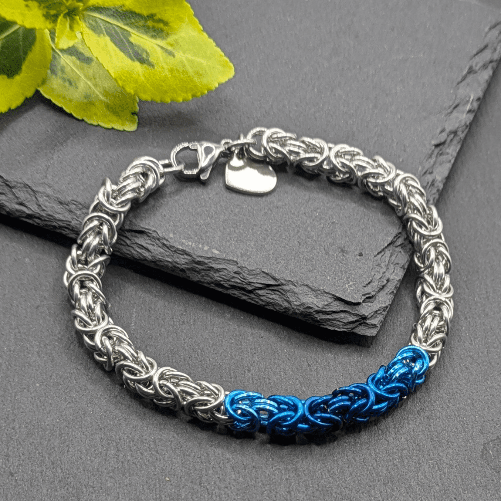 Byzantine chainmaille bracelet made with different shade of blue rings in the centre of the bracelet