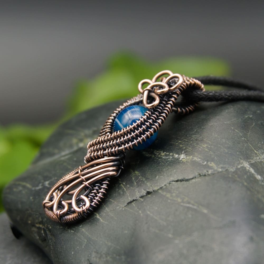 Figure of eight copper wire wrapped pendant necklace with blue agate by Oruki Design