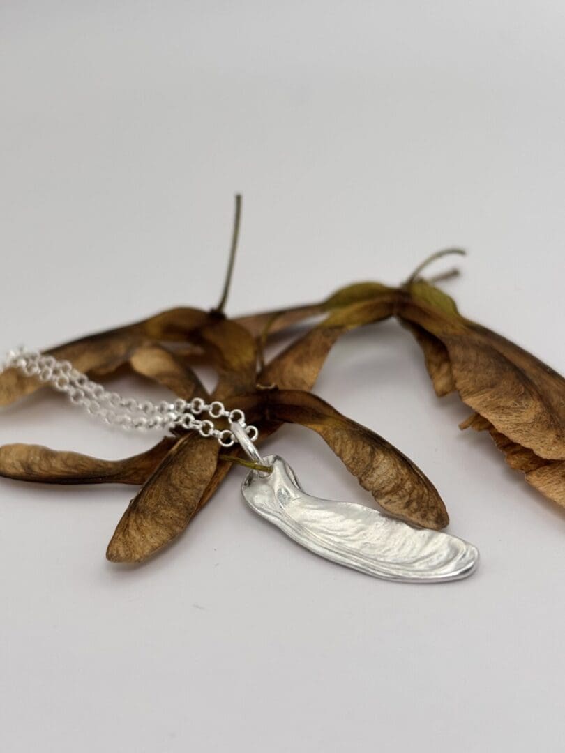 Silver sycamore key pendant