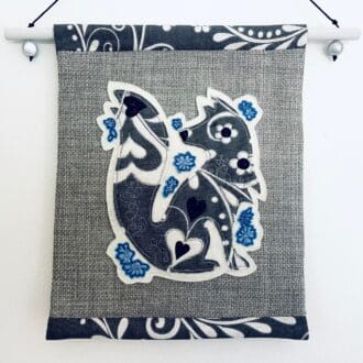 Grey and blue fox textile winter wall hanging