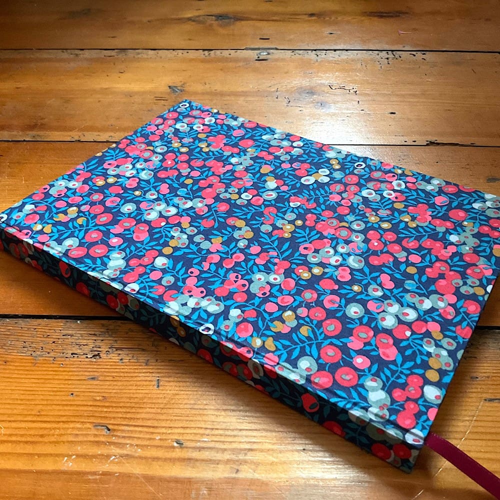 A5 Lined paper handmade notebook covered in Liberty Wiltshire Fabric