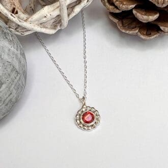 Handmade dainty silver circle necklace with garnet cubic zirconia