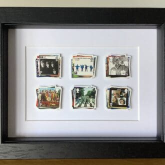 The Beatles framed postage stamps