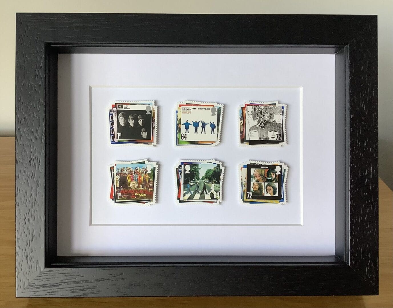 The Beatles framed postage stamps